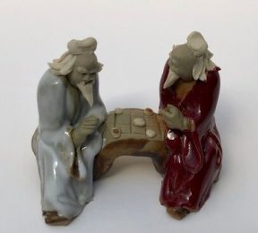 Ceramic Figurine Two Men Sitting On A Bench Playing Chess - 2.25" Color: Red & White