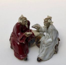 Ceramic Figurine Two Men Sitting On A Bench Reading Book - 2.25" Color: Red & White