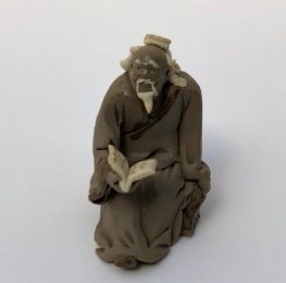 Ceramic Figurine Mud Man Reading Book - 2"
